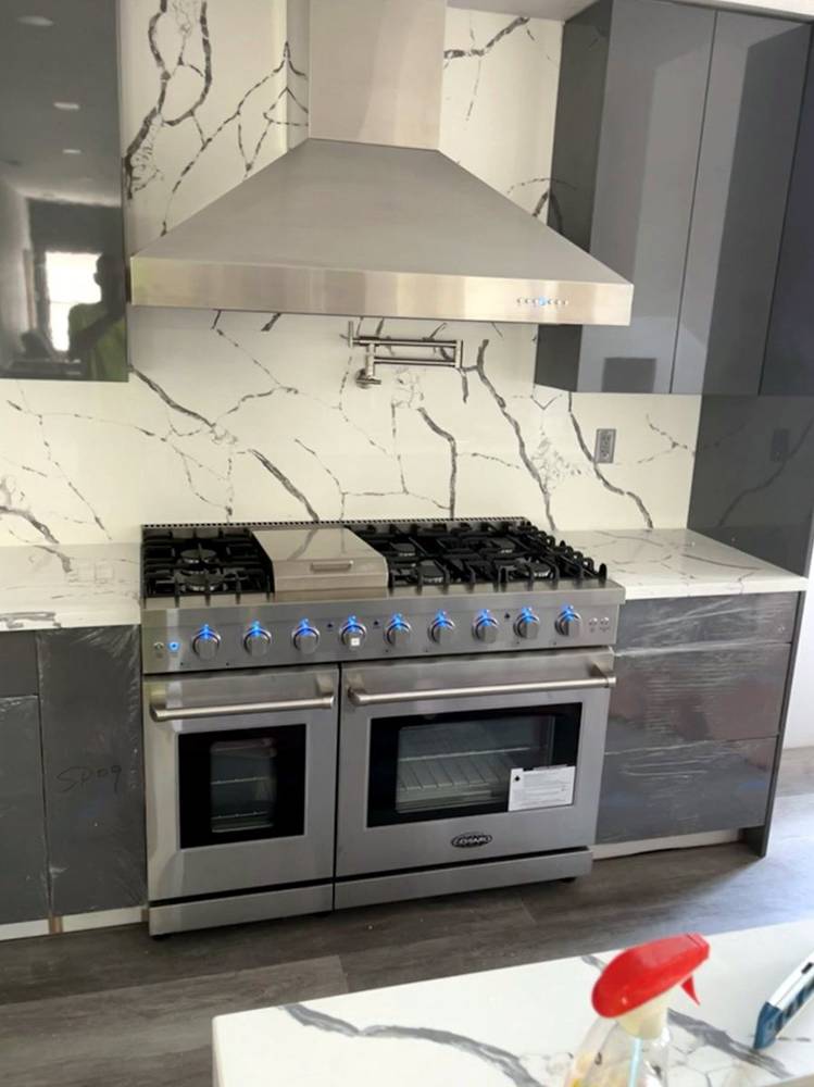 Marble kitchen — range and hood