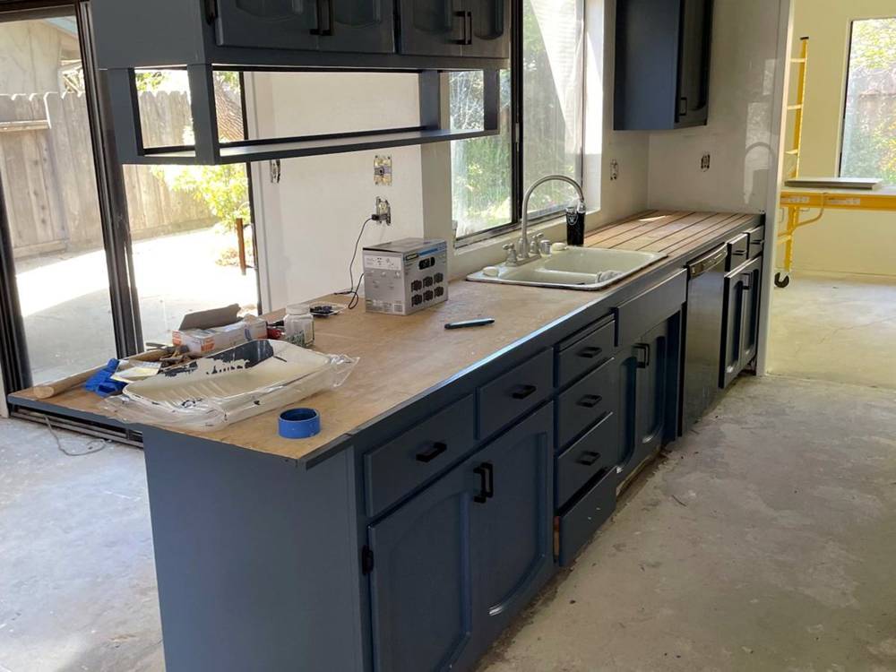 Cabinets refinished, March